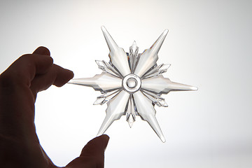 Image showing snoflake in the human hand