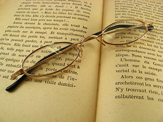 Image showing glasses on a book