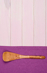 Image showing Kitchenware on purple towel