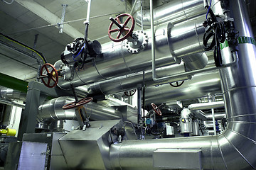 Image showing Equipment, cables and piping as found inside of a modern industr