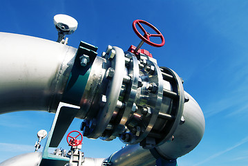 Image showing Industrial zone, Steel pipelines and valves against blue sky