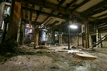 Image showing Old creepy, dark, decaying, destructive, dirty factory