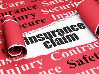 Image showing Insurance concept: black text Insurance Claim under the piece of  torn paper