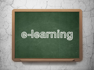 Image showing Learning concept: E-learning on chalkboard background