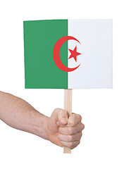 Image showing Hand holding small card - Flag of Algeria