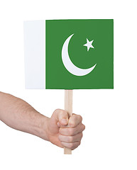 Image showing Hand holding small card - Flag of Pakistan