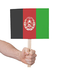 Image showing Hand holding small card - Flag of Afghanistan