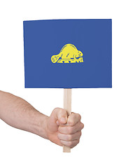 Image showing Hand holding small card - Flag of Oregon