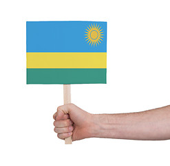 Image showing Hand holding small card - Flag of Rwanda