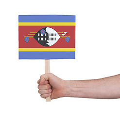 Image showing Hand holding small card - Flag of Swaziland