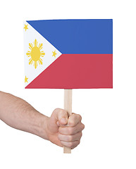 Image showing Hand holding small card - Flag of Philipines