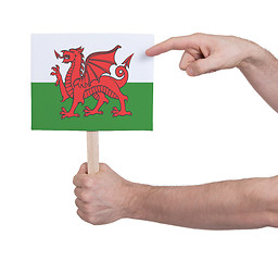 Image showing Hand holding small card - Flag of Wales