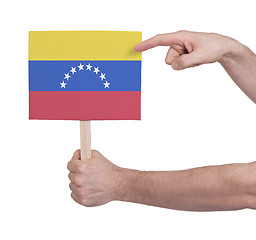 Image showing Hand holding small card - Flag of Venezuela