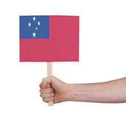 Image showing Hand holding small card - Flag of Samoa
