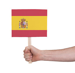 Image showing Hand holding small card - Flag of Spain