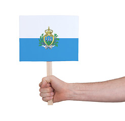 Image showing Hand holding small card - Flag of San Marino