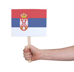 Image showing Hand holding small card - Flag of Serbia