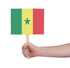 Image showing Hand holding small card - Flag of Senegal