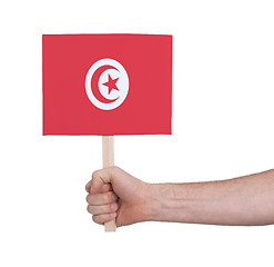 Image showing Hand holding small card - Flag of Tunisia