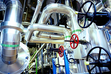 Image showing Equipment, cables and piping as found inside of a modern industr