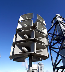 Image showing Isolated loudspeakers with a natural blue background  