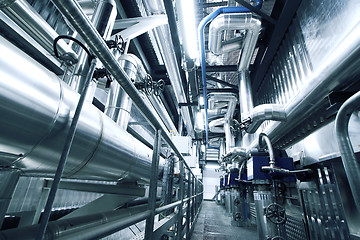 Image showing Equipment, cables and piping as found inside of a modern industr