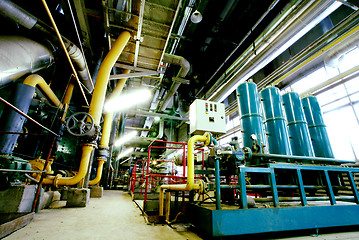 Image showing Equipment, cables and piping as found inside of a modern industr