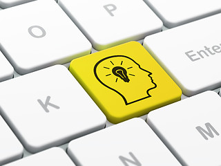 Image showing Studying concept: Head With Lightbulb on computer keyboard background