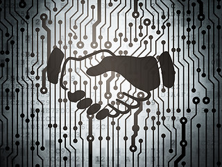 Image showing Business concept: circuit board with Handshake
