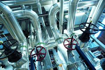 Image showing Equipment, cables and piping as found inside of a modern industr