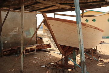 Image showing Boat under construction in the shade_6183