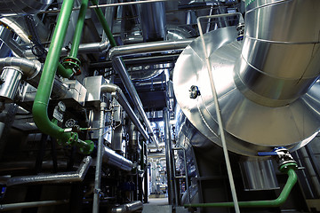 Image showing Equipment, cables and piping as found inside of a modern industr