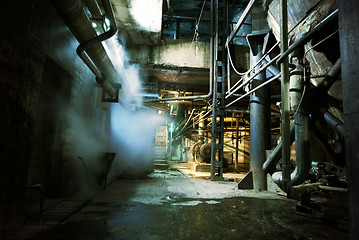 Image showing Old creepy, dark, decaying, destructive, dirty factory