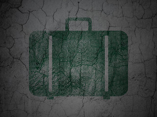 Image showing Vacation concept: Bag on grunge wall background