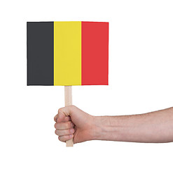 Image showing Hand holding small card - Flag of Belgium