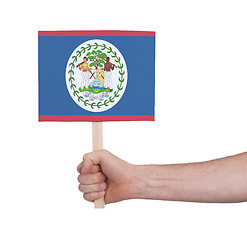 Image showing Hand holding small card - Flag of Belize