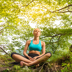 Image showing Woman relaxing in beautiful nature.