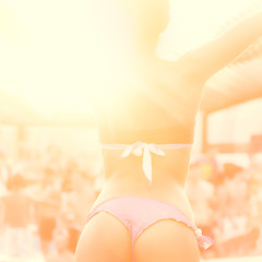 Image showing Sexy girl dancing on a beach party.