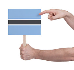 Image showing Hand holding small card - Flag of Botswana