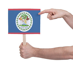 Image showing Hand holding small card - Flag of Belize