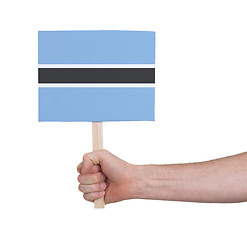 Image showing Hand holding small card - Flag of Botswana