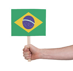 Image showing Hand holding small card - Flag of Brazil