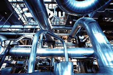 Image showing Equipment, cables and piping as found inside of a modern industr