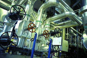Image showing Equipment, cables and piping as found inside of a modern industr