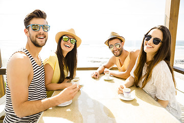 Image showing Friends at the beach bar