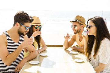 Image showing Friends at the beach bar