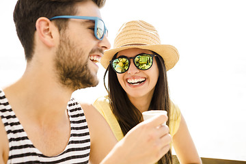 Image showing Friends at the beach bar