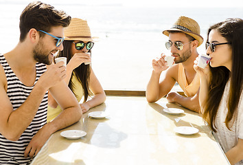 Image showing Friends at the beach bar