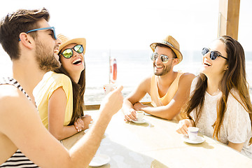 Image showing Friends at the beach bar