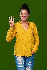 Image showing Woman showing three fingers